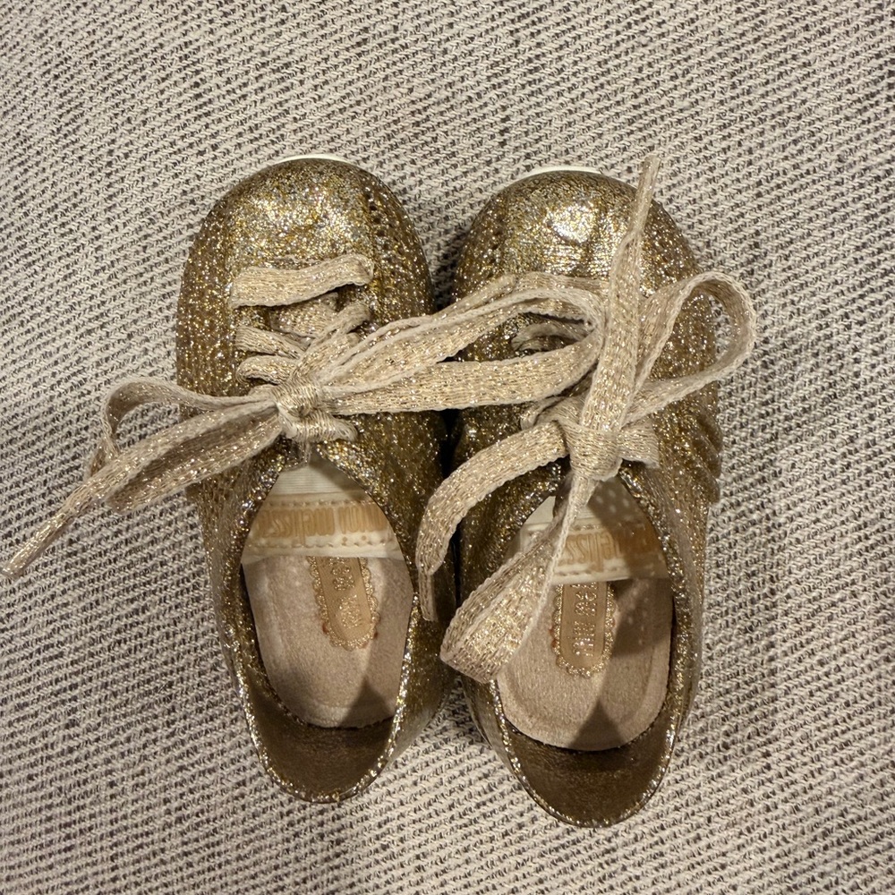 SOLD ❌ Mini Melissa Gold Glitter Lace-Up Sneakers (5c, run SMALL)